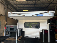 Load image into Gallery viewer, Customer Classified: Used 2017 Fleet Four Wheel Camper with Front Dinette