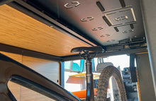 Load image into Gallery viewer, Rigwell Nomad Murphy Bed and Storage System for Mercedes Sprinter Van / Ford Transit Van / RAM ProMaster Van