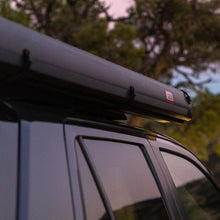 Load image into Gallery viewer, ARB Hard Case Awning with LED Light - Black Edition