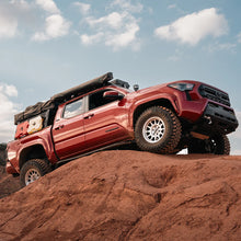 Load image into Gallery viewer, Cali Raised Step Edition Rock Sliders for 2024+ Toyota Tacoma