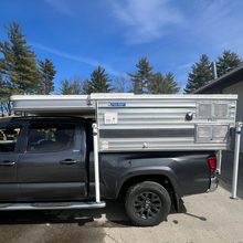 Load image into Gallery viewer, Customer Classified: Used 2016 FLEET Four Wheel Camper with Side Dinette Floor Plan