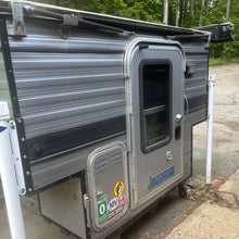 Load image into Gallery viewer, Customer Classified: Used 2021 SWIFT Four Wheel Camper Base Model Open Floor Plan with Rollover Couch