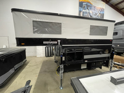 An In-Stock Showroom Inventory: 2025 HAWK Four Wheel Camper Base Model with Front Dinette Floor Plan