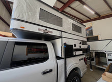 Load image into Gallery viewer, Customer Classified: Used 2025 RAVEN Four Wheel Camper with Rollover Couch Floor Plan
