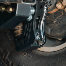 Load image into Gallery viewer, Cali Raised Rear Shock Skid Plates for 2005+ Toyota Tacoma
