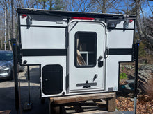 Load image into Gallery viewer, Customer Classified: Used 2025 RAVEN Four Wheel Camper with Rollover Couch Floor Plan
