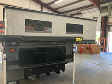 Load image into Gallery viewer, Customer Classified: Used 2023 FLEET Four Wheel Camper with Rollover Couch Floor Plan
