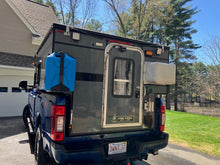 Load image into Gallery viewer, Customer Classified: Used 2023 HAWK Four Wheel Camper Base Model with Rollover Couch Floor Plan
