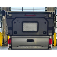 Load image into Gallery viewer, Customer Classified: Used PROJECT M Four Wheel Camper Truck Bed Topper for Mid-Size Trucks with 5' Bed
