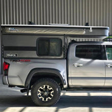 Load image into Gallery viewer, Customer Classified: Used PROJECT M Four Wheel Camper Truck Bed Topper for Mid-Size Trucks with 5' Bed
