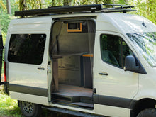 Load image into Gallery viewer, Flatline Van Co Modular Cabinet Bed for 2015+Ford Transit Van
