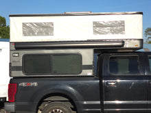 Load image into Gallery viewer, Customer Classified: Used 2023 HAWK Four Wheel Camper with Rollover Couch Floor Plan
