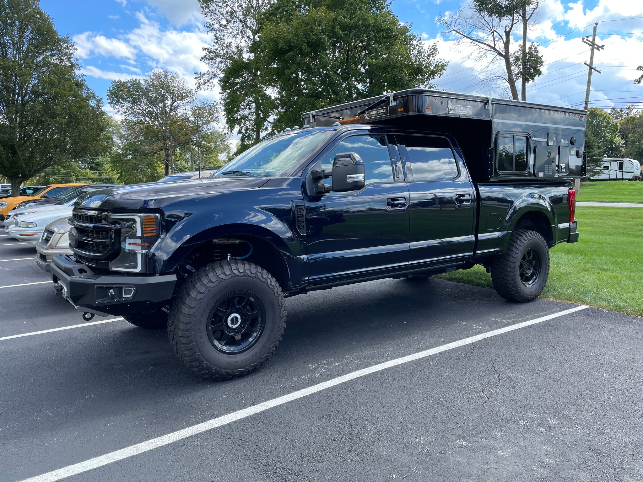 4x4 camper ford MLO Show Vehicle: 2022 Ford F-250 & 2022 Hawk Four Wheel Camper – Main Line Overland